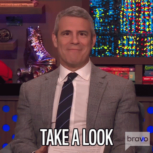 Man in Suit and Tie Says Take a Look on Bravo
