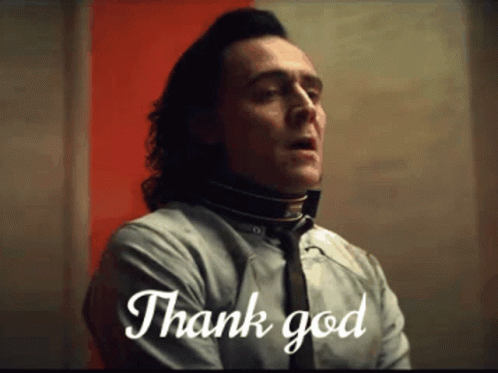 Man in Suit and Tie Says Thank God