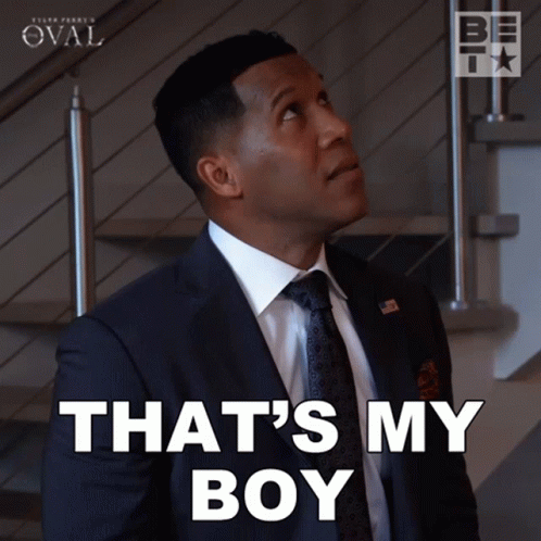 Man In Suit And Tie Says That's My Boy GIF