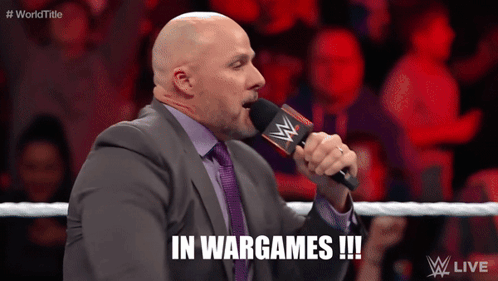 Man In Suit And Tie Says WarGames !!! GIF