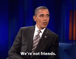 Man in Suit and Tie Says We Are Not Friends