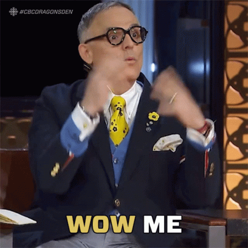 Man in Suit and Tie Says Wow Me