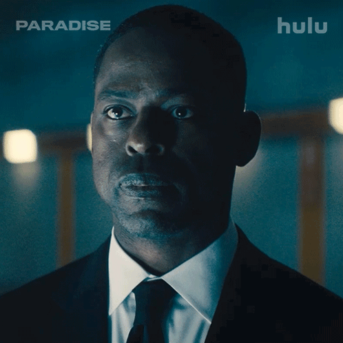 Man In Suit And Tie Says Yes On Hulu GIF