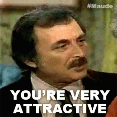Man in Suit and Tie Says You're Very Attractive