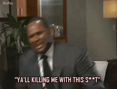 Man In Suit And Tie Screaming Pointing At Camera GIF
