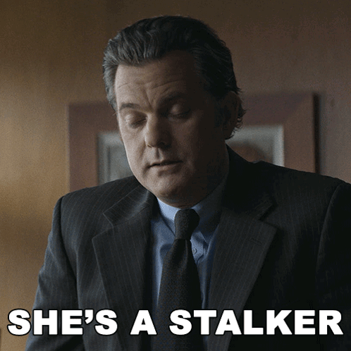 Man in Suit and Tie She Stalker