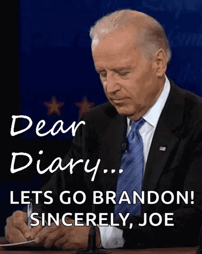 Man In Suit And Tie Signing Dear Diary GIF