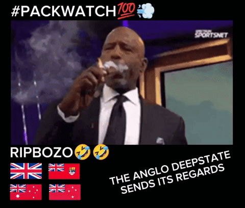 Man In Suit And Tie Singing Into Microphone And Smoking GIF