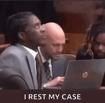 Man In Suit And Tie Sitting At Laptop GIF