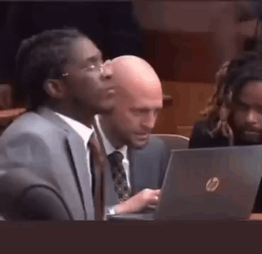 Man In Suit And Tie Sitting At Laptop GIF