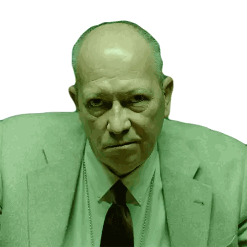 Man in Suit and Tie Sitting