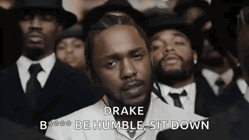Man in Suit and Tie Sitting