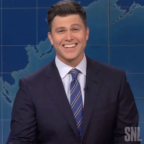 Man In Suit And Tie Smiling At SNL GIF