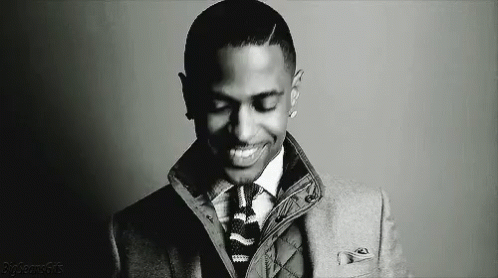 Man in Suit and Tie Smiling Black and White