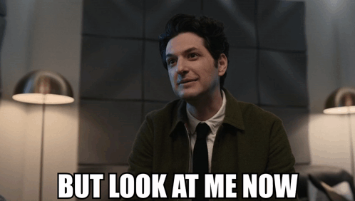 Man In Suit And Tie Smiling GIF