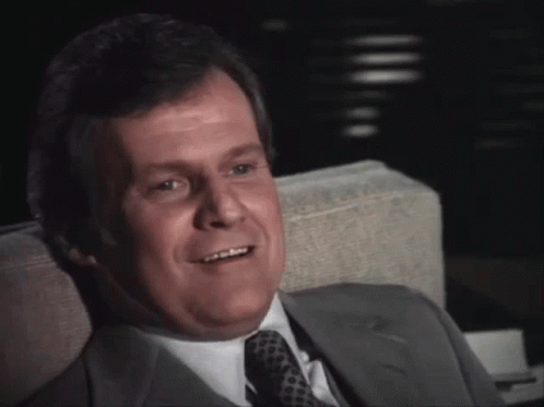 Man In Suit And Tie Smiling GIF