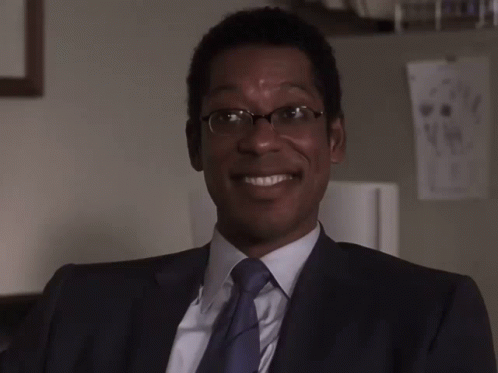 Man in Suit and Tie Smiling