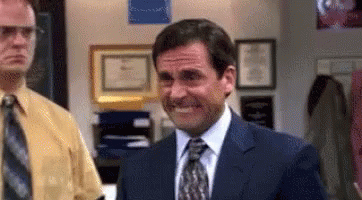Man In Suit And Tie Smiling Next To Another Man GIF