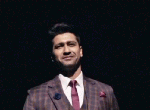 Man in Suit and Tie Smiling