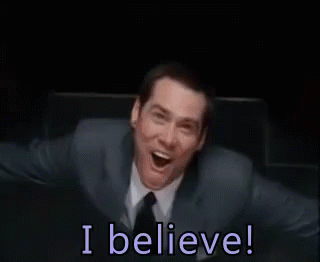 Man in Suit and Tie Smiling Saying I Believe