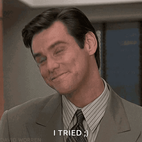 Man in Suit and Tie Smiling Saying I Tried
