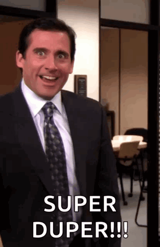 Man in Suit and Tie Smiling Saying Super Duper
