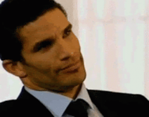 Man in Suit and Tie Smiling