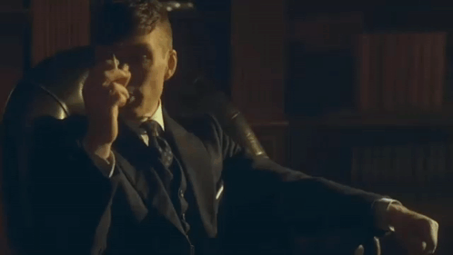 Man In Suit And Tie Smoking Cigar Says Your Plan Was Full Of Holes GIF