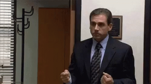 Man in Suit and Tie Standing