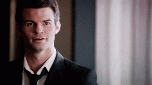 Man In Suit And Tie Standing GIF