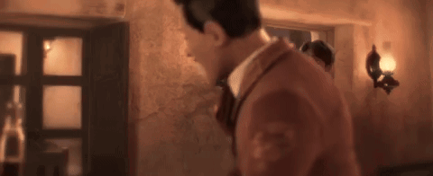 Man In Suit And Tie Standing GIF