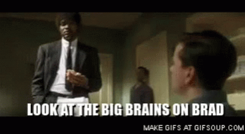 Man In Suit And Tie Standing Next To Another Man GIF