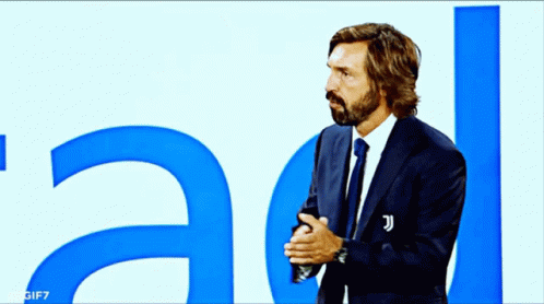 Man in Suit and Tie Standing