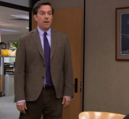 Man in Suit and Tie Standing