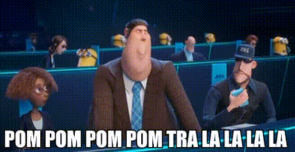 Man In Suit And Tie Standing With Minions GIF