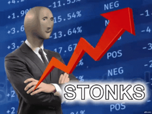 Man in Suit and Tie Stands Before Stonks Chart