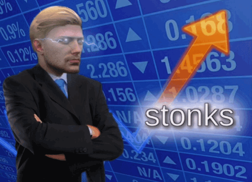 Man in Suit and Tie Staring at Stock Chart