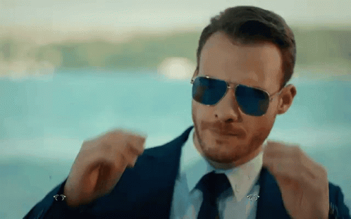 Man in Suit and Tie Sunglasses