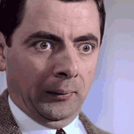 Man In Suit And Tie Surprised GIF