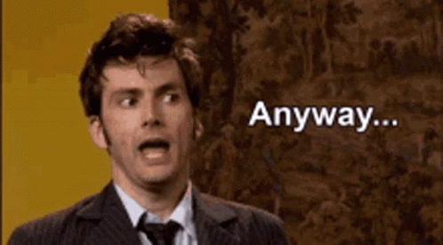 Man In Suit And Tie Surprised Saying Anyway GIF