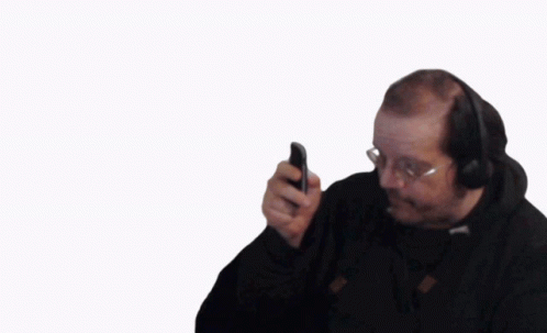 Man In Suit And Tie Talking On Cell Phone GIF