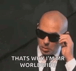 Man in Suit and Tie Talking on Phone