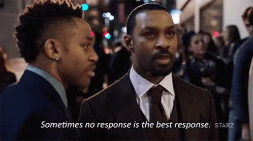 Man In Suit And Tie Talking To Another Man GIF