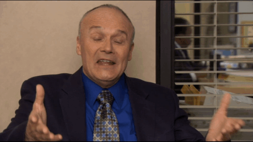 Man in Suit and Tie Talking