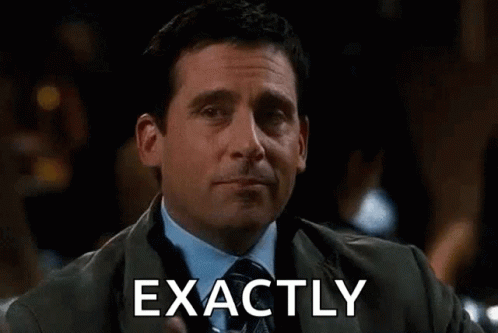 Man In Suit And Tie Toasting With Drink GIF