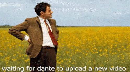 Man In Suit And Tie Waiting In Yellow Flowers For Dante New Video GIF