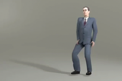 Man in Suit and Tie Walking