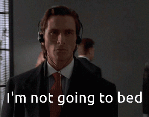 Man In Suit And Tie Wearing Headphones GIF