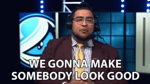 Man in Suit and Tie Wearing Headphones