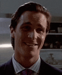 Man In Suit And Tie Wearing Headset GIF